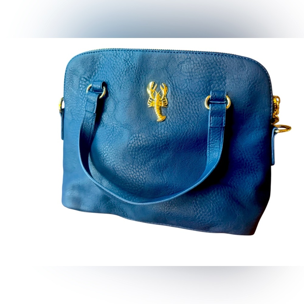 Charming Charlie navy blue vegan leather handbag.